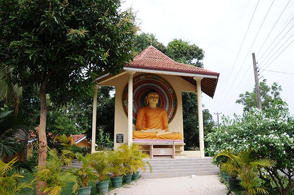 Buddha beside the road