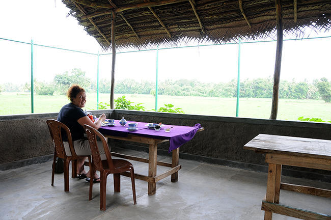 Having breakfast with rice field view