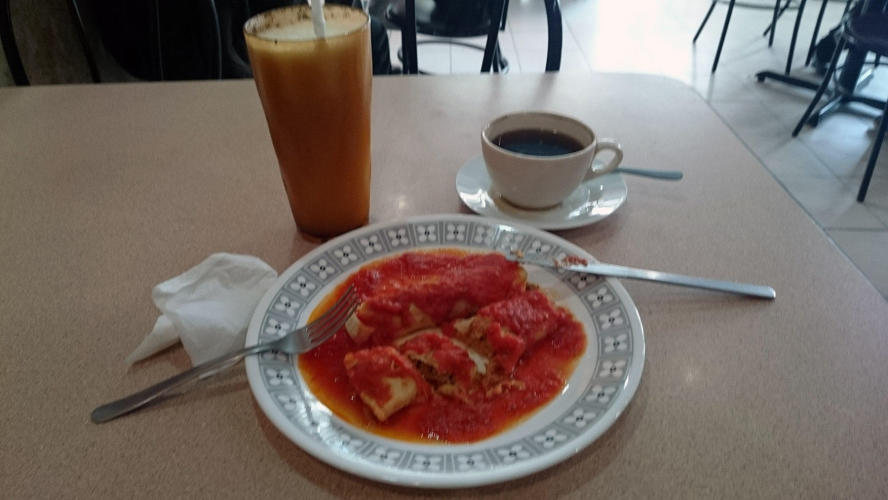 My breakfast some "tomatadas" tortillas with chicken and tomate souce