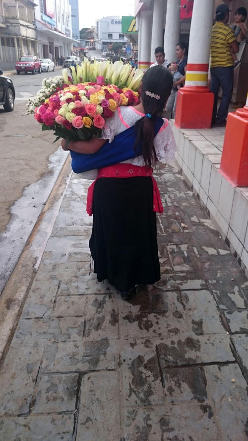 Maya woman selling flowers