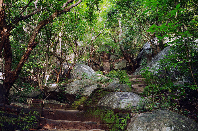 Climbing up the temple rock