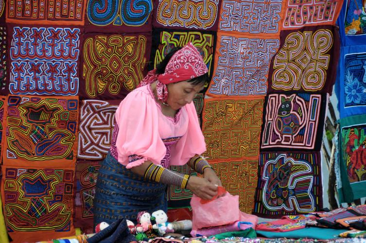 Cuna woman selling her art at Plaza Francia