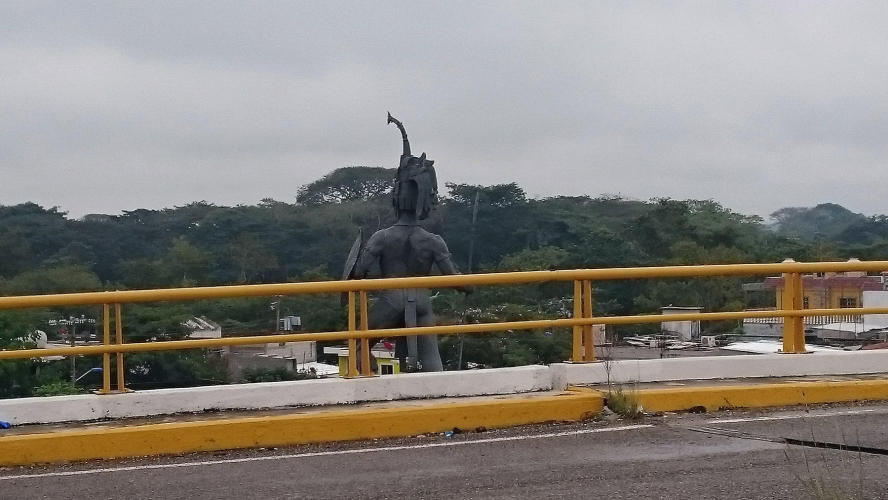 A big indian statue I could only see from behind