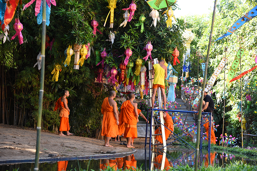 Monks and novices doing some decorations