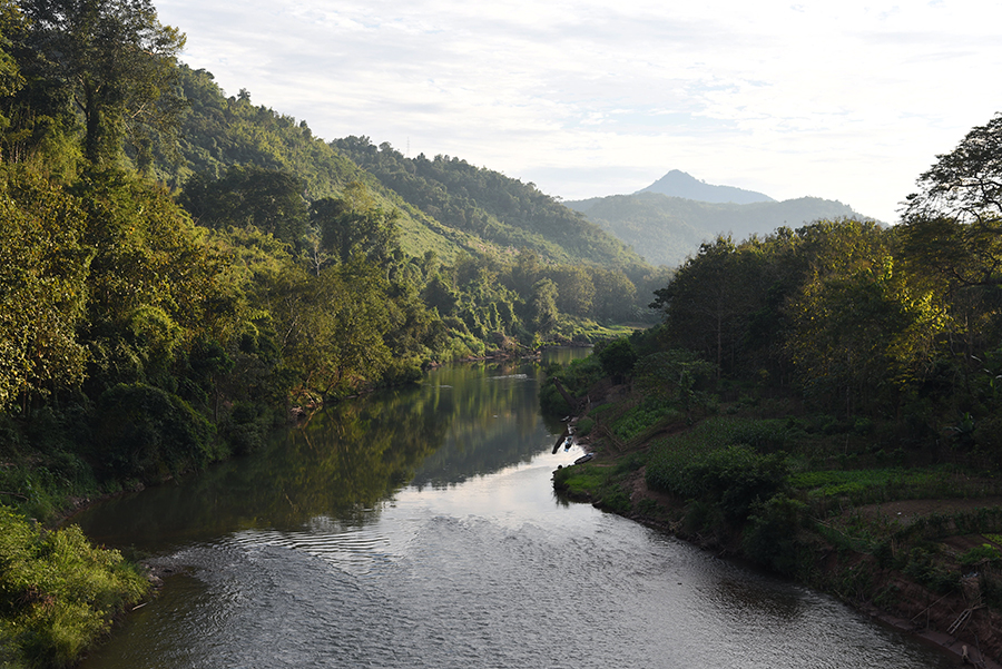 The road going parallel to the river